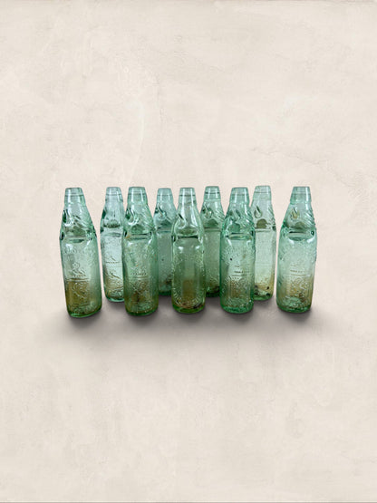 Collection of 9 English Antique Aqua Glass Cod Neck Marble Bottles, Bristol, Circa 1900