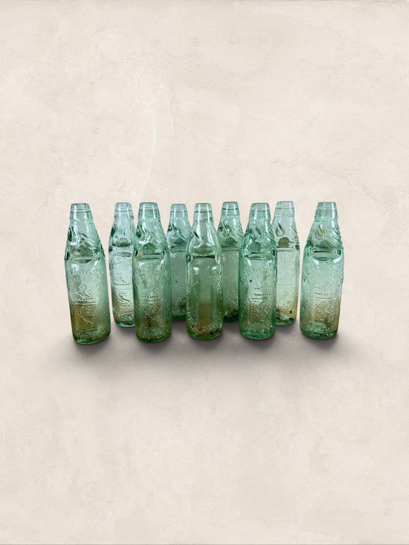 Collection of 9 English Antique Aqua Glass Cod Neck Marble Bottles, Bristol, Circa 1900