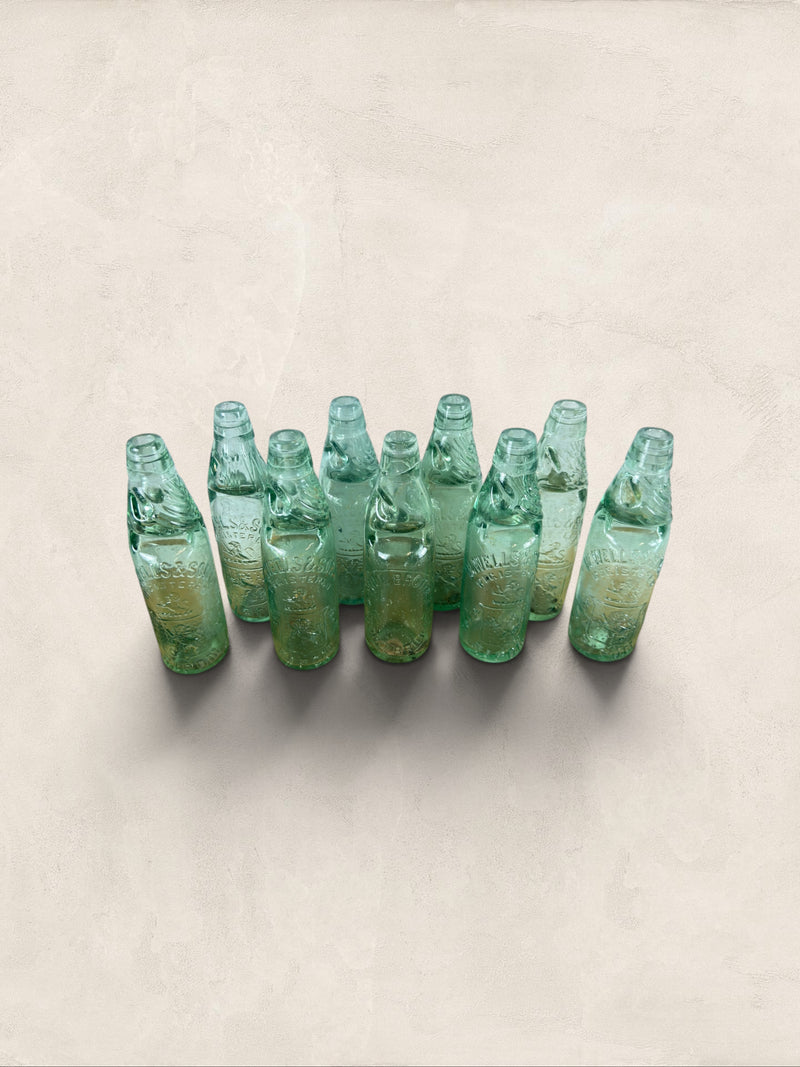 Collection of 9 English Antique Aqua Glass Cod Neck Marble Bottles, Bristol, Circa 1900