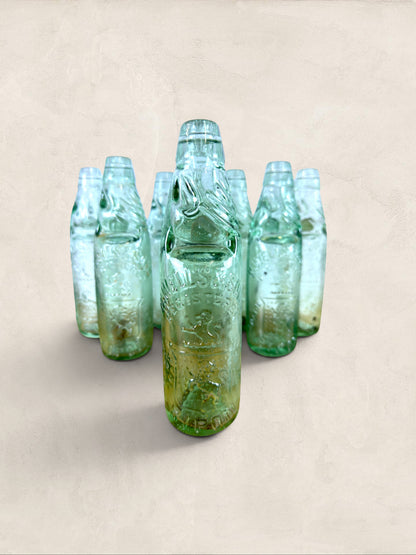 Collection of 9 English Antique Aqua Glass Cod Neck Marble Bottles, Bristol, Circa 1900