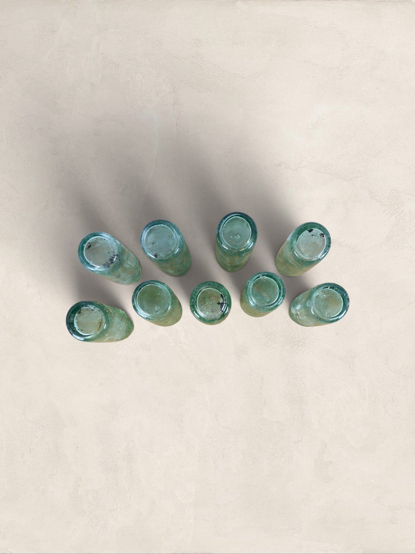 Collection of 9 English Antique Aqua Glass Cod Neck Marble Bottles, Bristol, Circa 1900