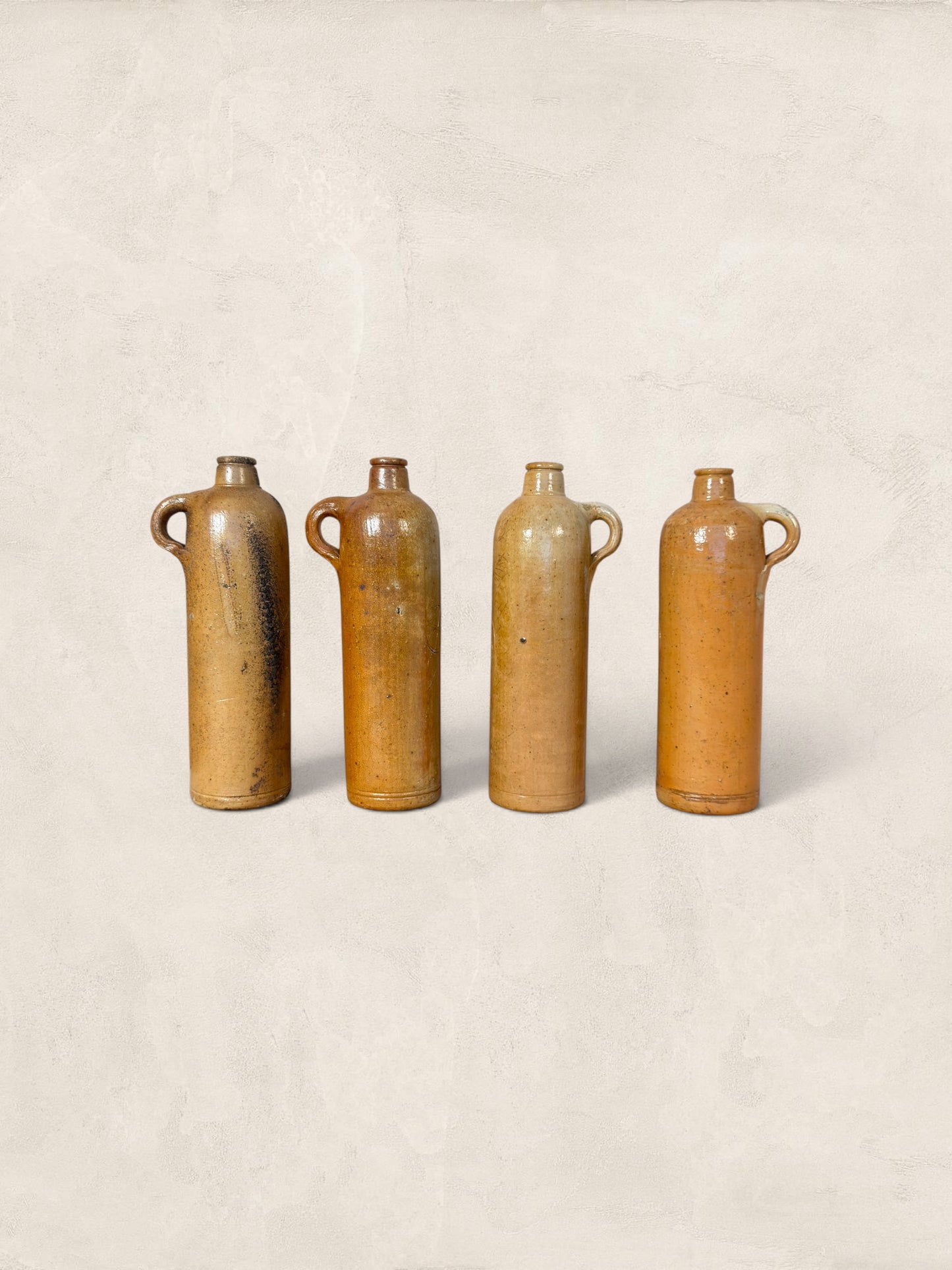 Set of Four Stoneware Bottles