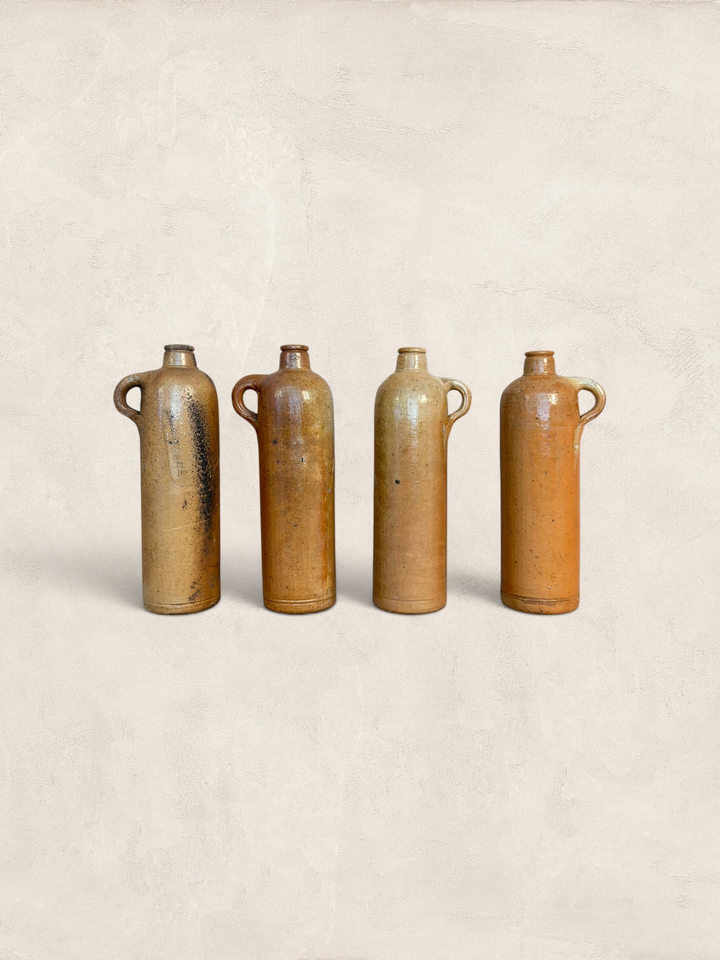 Set of Four Stoneware Bottles