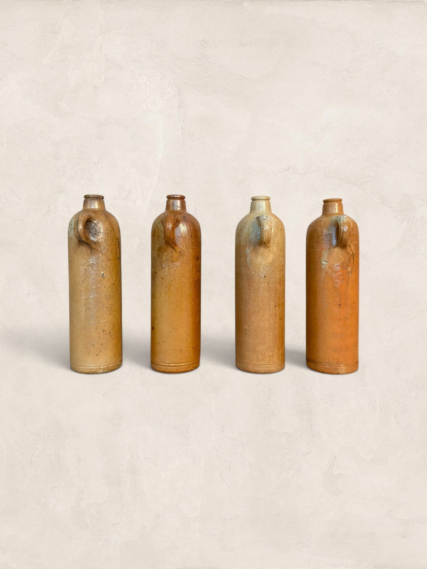 Set of Four Stoneware Bottles