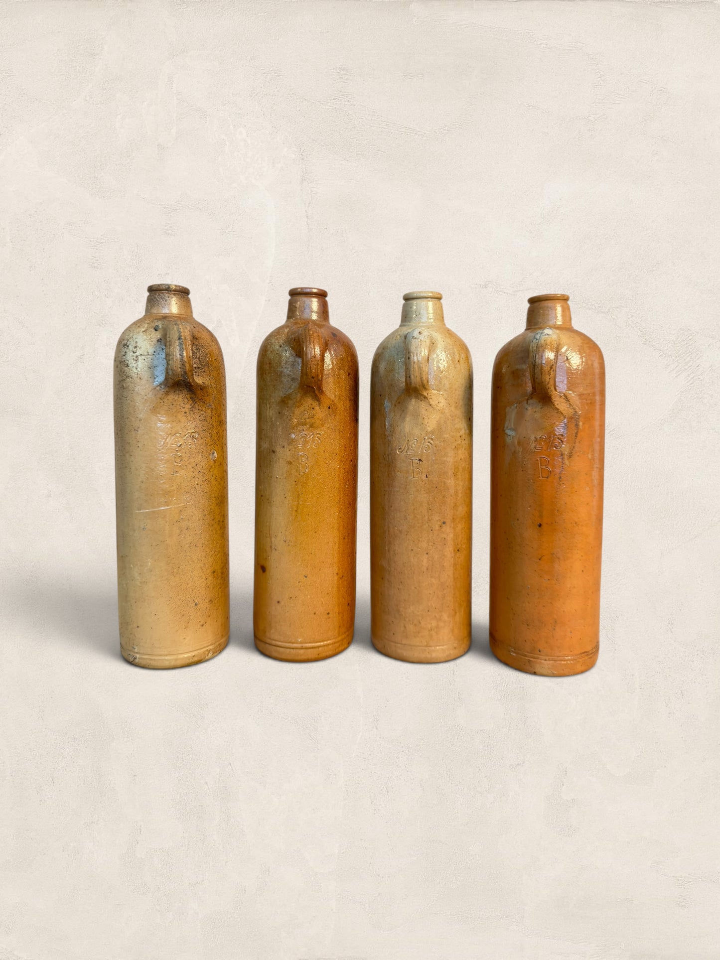 Set of Four Stoneware Bottles