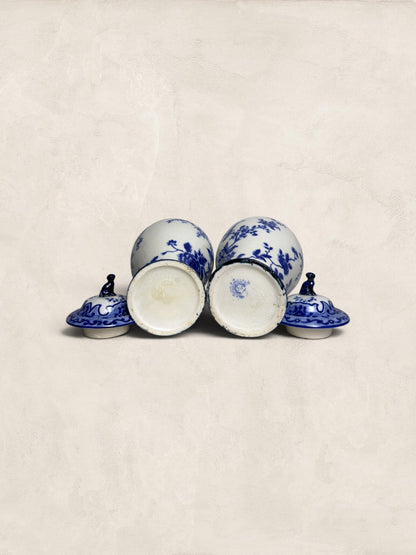 Pair of Blue & White Crackle Glazed Covered Urns with Bird Finials