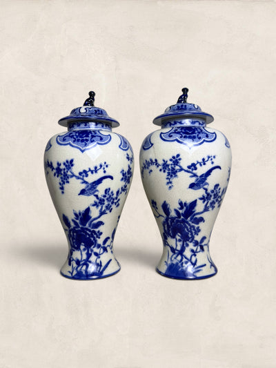 Pair of Blue & White Crackle Glazed Covered Urns with Bird Finials