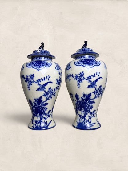 Pair of Blue & White Crackle Glazed Covered Urns with Bird Finials