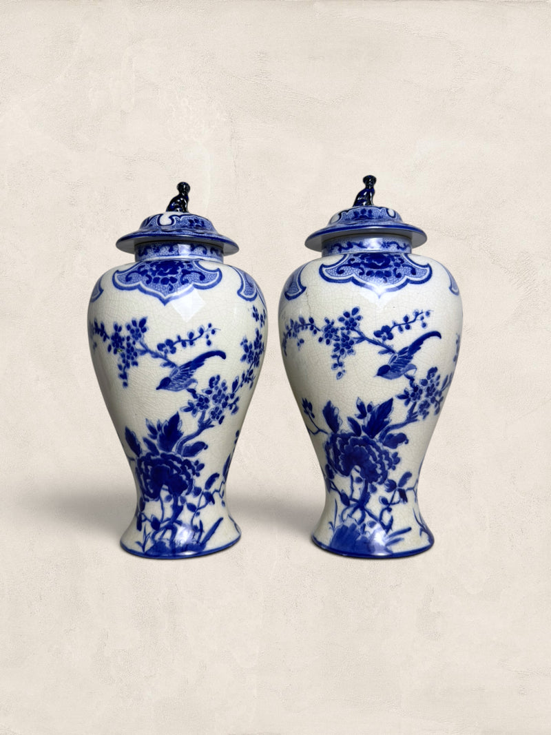 Pair of Blue & White Crackle Glazed Covered Urns with Bird Finials