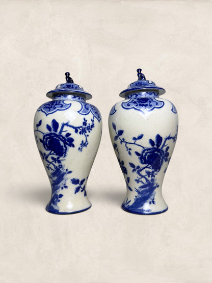 Pair of Blue & White Crackle Glazed Covered Urns with Bird Finials