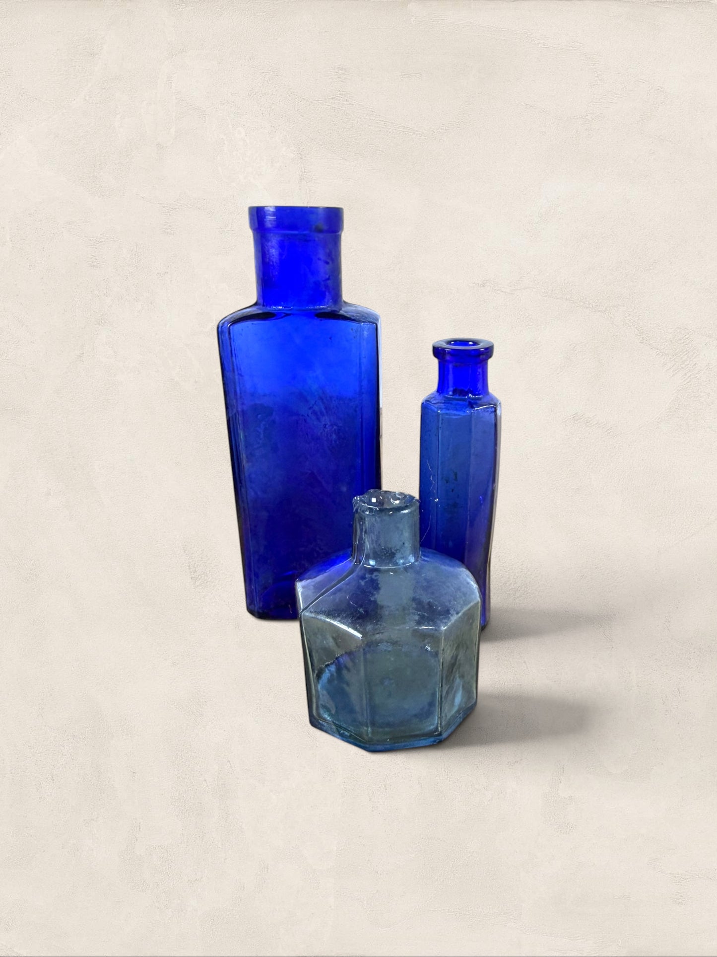 Set of Three English Cobalt Blue Glass Apothecary Bottles