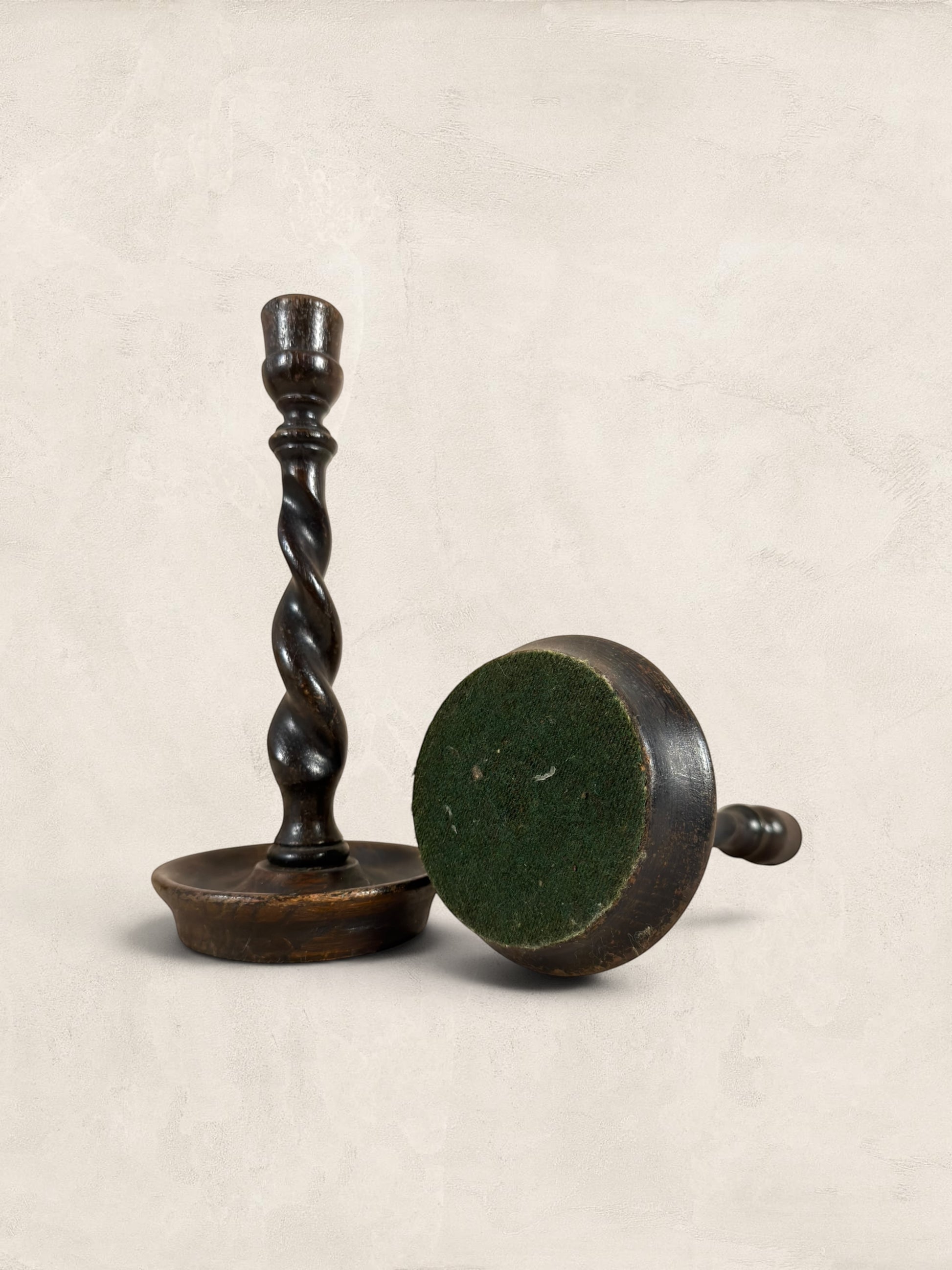 Stone and Relic antique oak barley twist candlestick holders, circa 1910. Dark wood with a rich patina and hand-carved spiral stems.