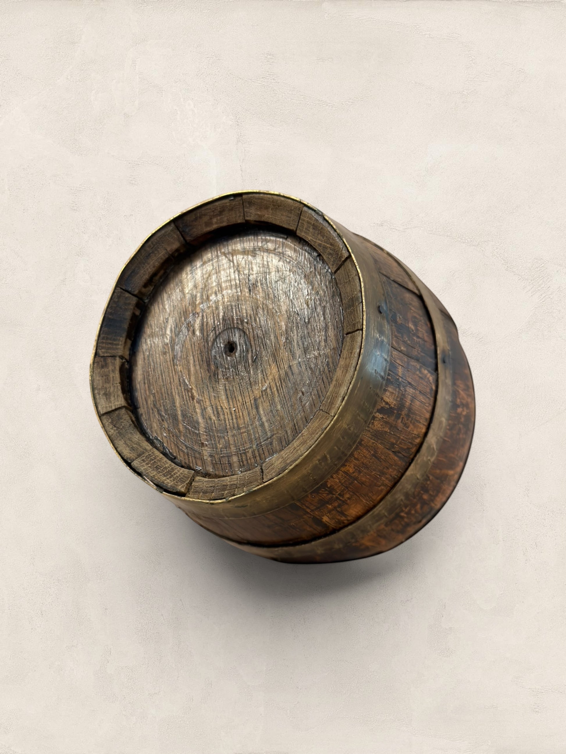 Antique French barrel-shaped cider/wine jug from Stone and Relic, made of staved oak with copper banding and a forged metal handle. Decorative item.