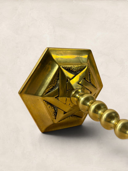 Stone and Relic pair of vintage brass hexagonal base candlesticks with beaded stem and aged patina.